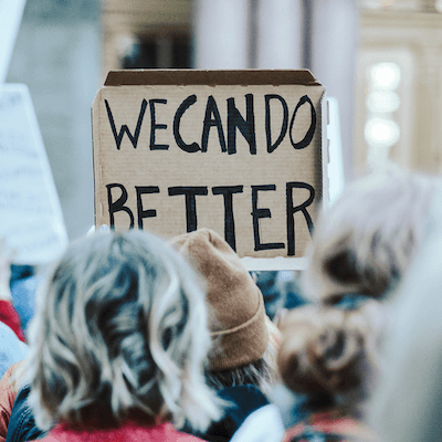 Photo of "We Can Do Better" Sign